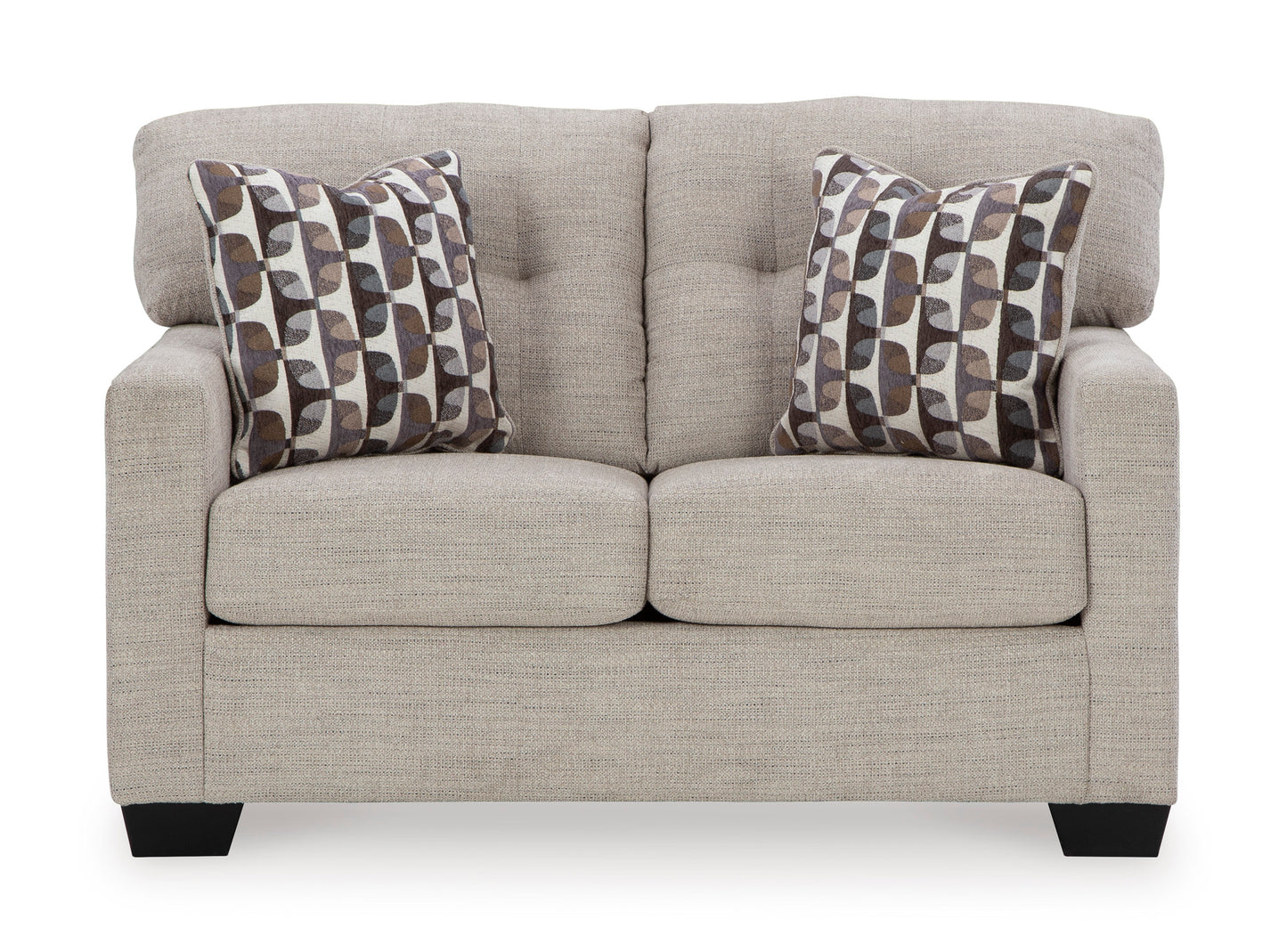 Gray sofa with patterned cushions on a white background
