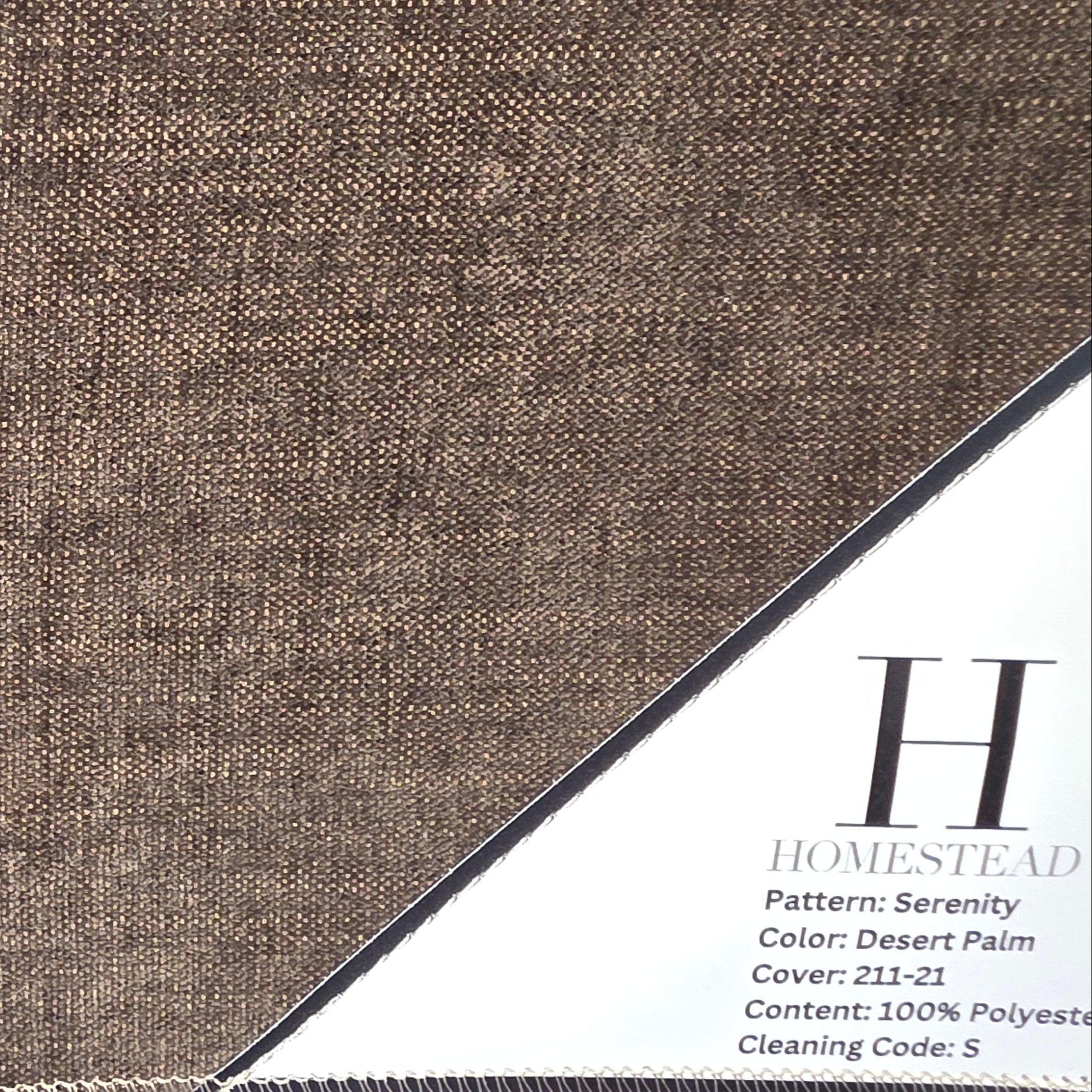 A close-up of a woven fabric swatch in a warm taupe-brown color with a fringed edge, shown alongside printed product cards from Homestead.