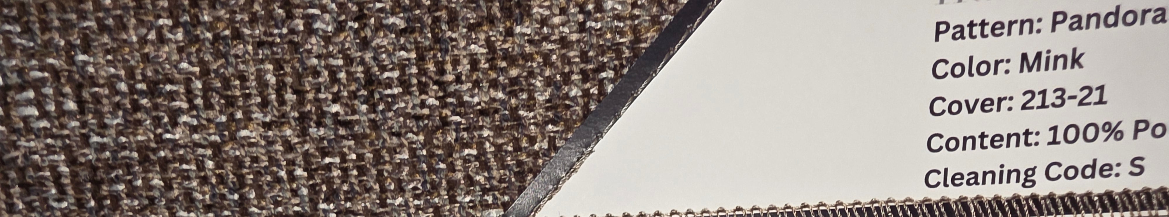 Two carpet samples with printed labels, showing close-up woven textures. The top sample is a mink-toned beige and brown, and the bottom sample is navy blue.