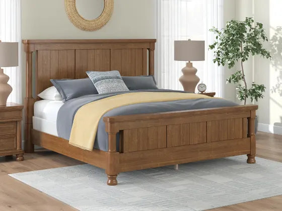 Taking a laid-back approach to casual traditional design, this artfully crafted king poster bed features a handsomely hefty yet fashionably proportioned silhouette. Its rich medium brown wood tone exudes a comfy, timeless appeal that's sure to carry you away to a dreamy time and place. This easy-to-love look makes just the right statement.

hillsmattressmore.com