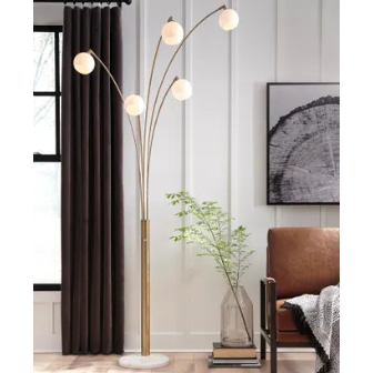 Modern floor lamp with multiple lights in a living room setting. Taliya Metal Arc Lamp hillsmattressmore.com