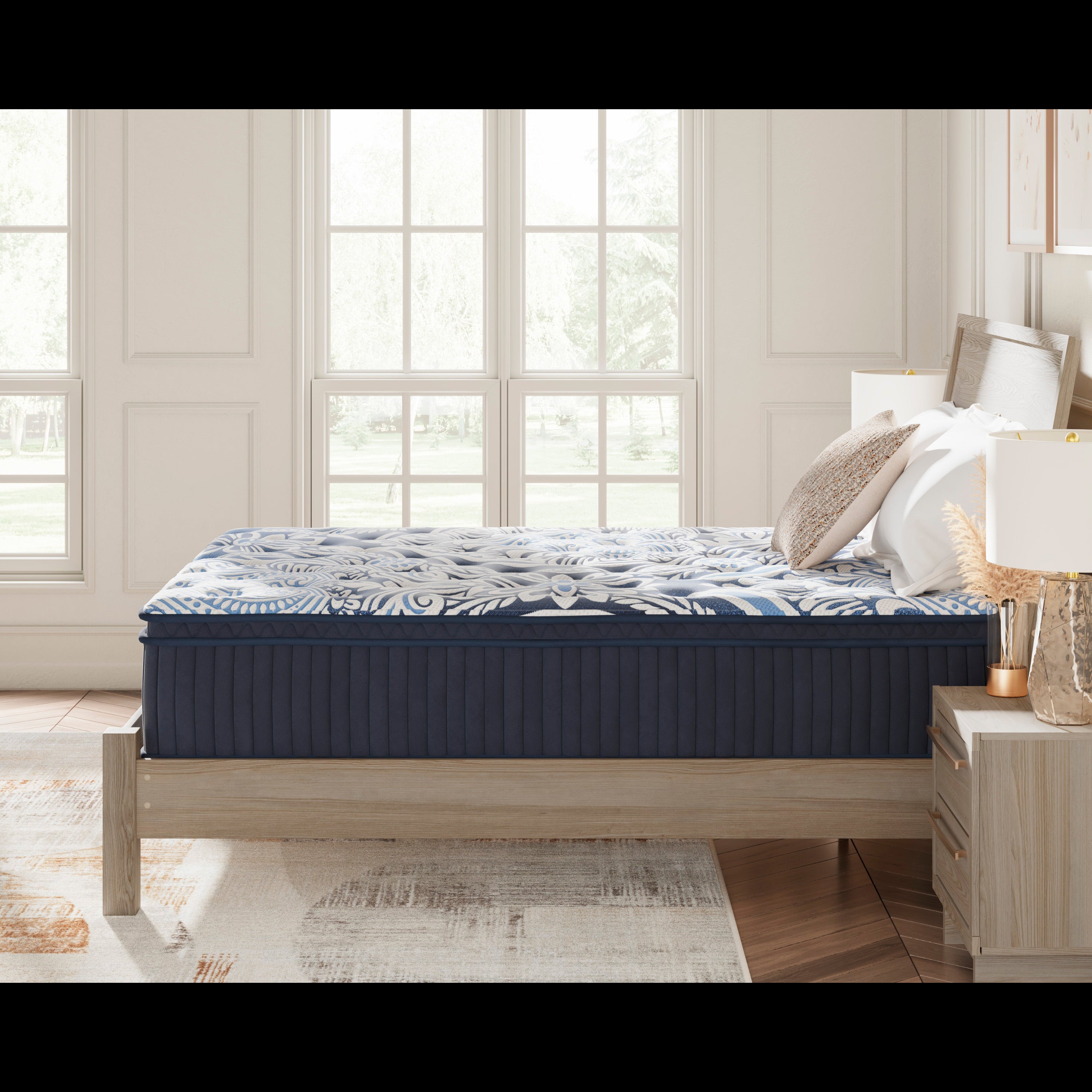 Side view of blue plush mattress