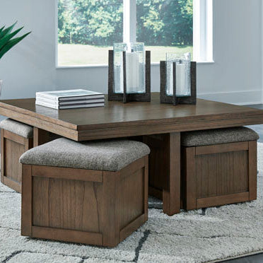 Wooden dining table with four matching benches in a modern living room setting.