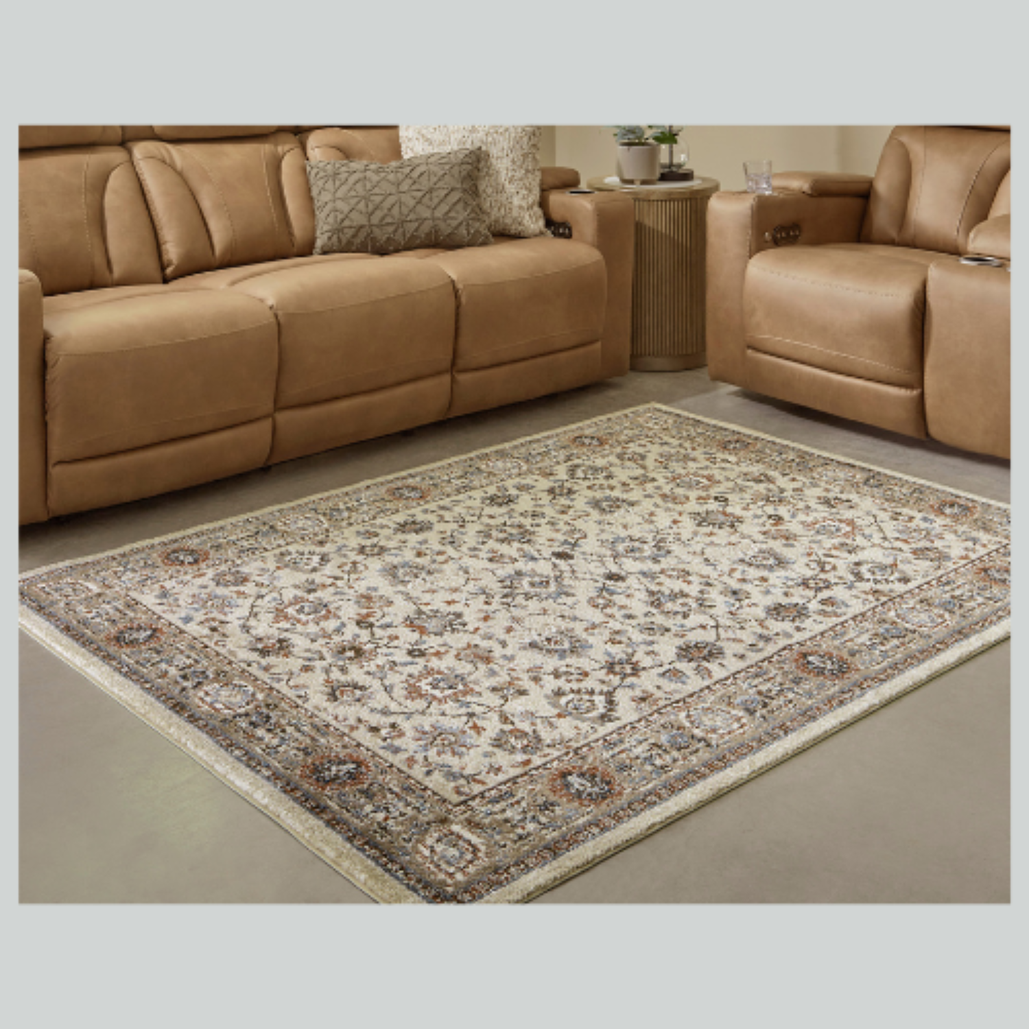 Patterned rug on a gray floor with a brown sectional sofa in the background